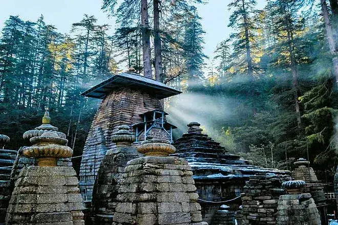 Ancient stone temples shaded by deodar trees at Jageshwar Dham
