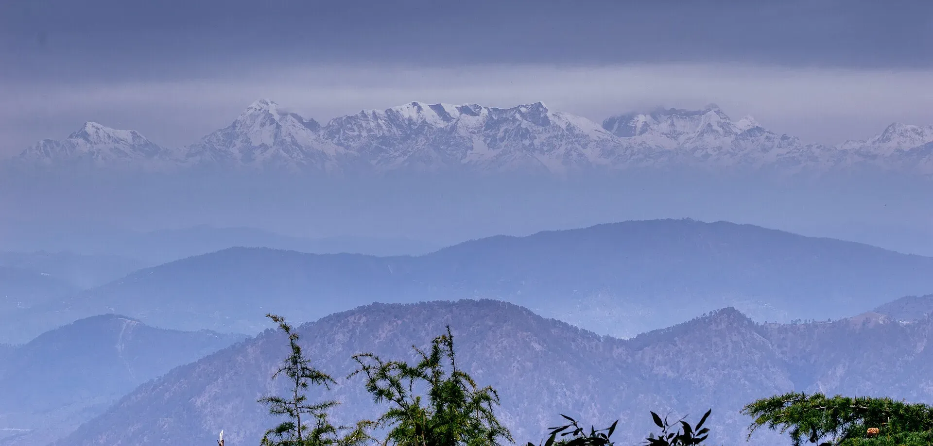 Snow-capped Himalayan range seen from the hills above Nainital